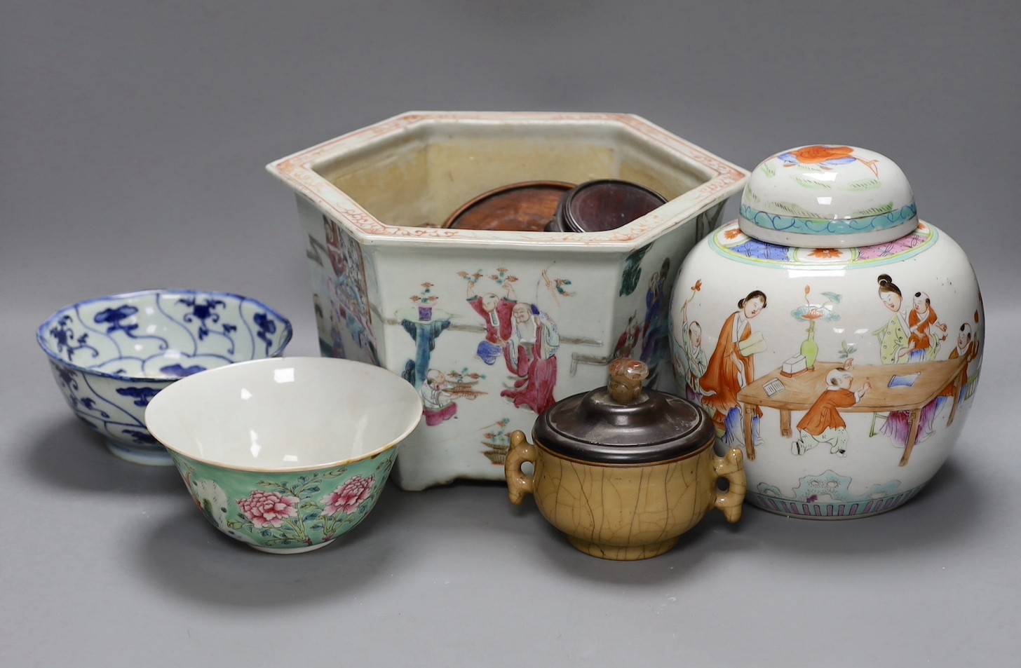 A 19th century Chinese famille rose planter, a jar and cover, two bowls and a crackle ware censer and wood cover, plater 16 cms high